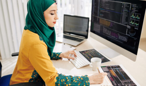 Software developer working on programming cod Software developer working on programming cod